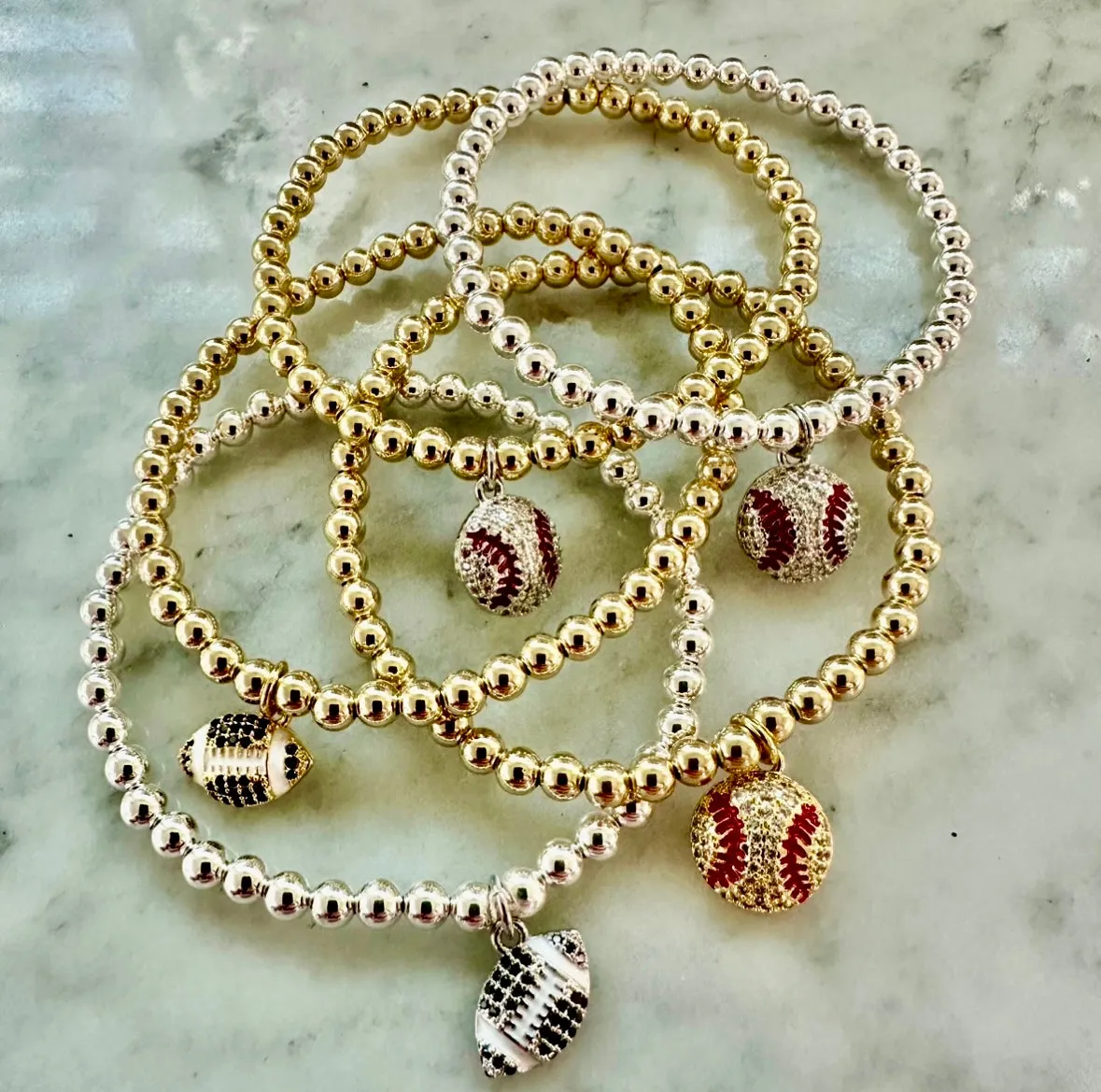 4mm Bead Stretch Bracelet with Matching Cubic Zirconia Sports Charm