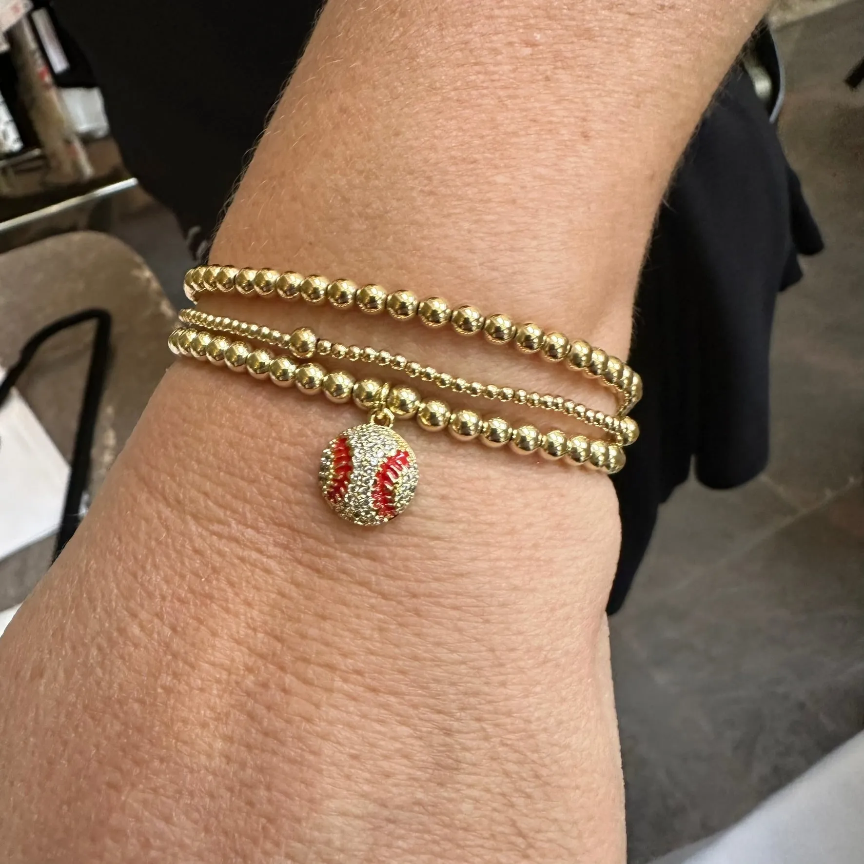 4mm Bead Stretch Bracelet with Matching Cubic Zirconia Sports Charm