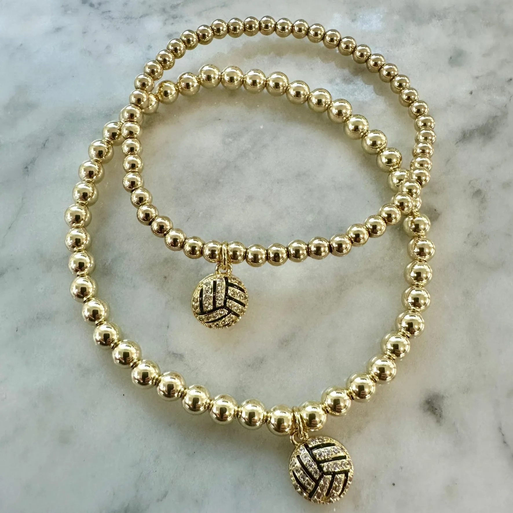 4mm Bead Stretch Bracelet with Matching Cubic Zirconia Sports Charm