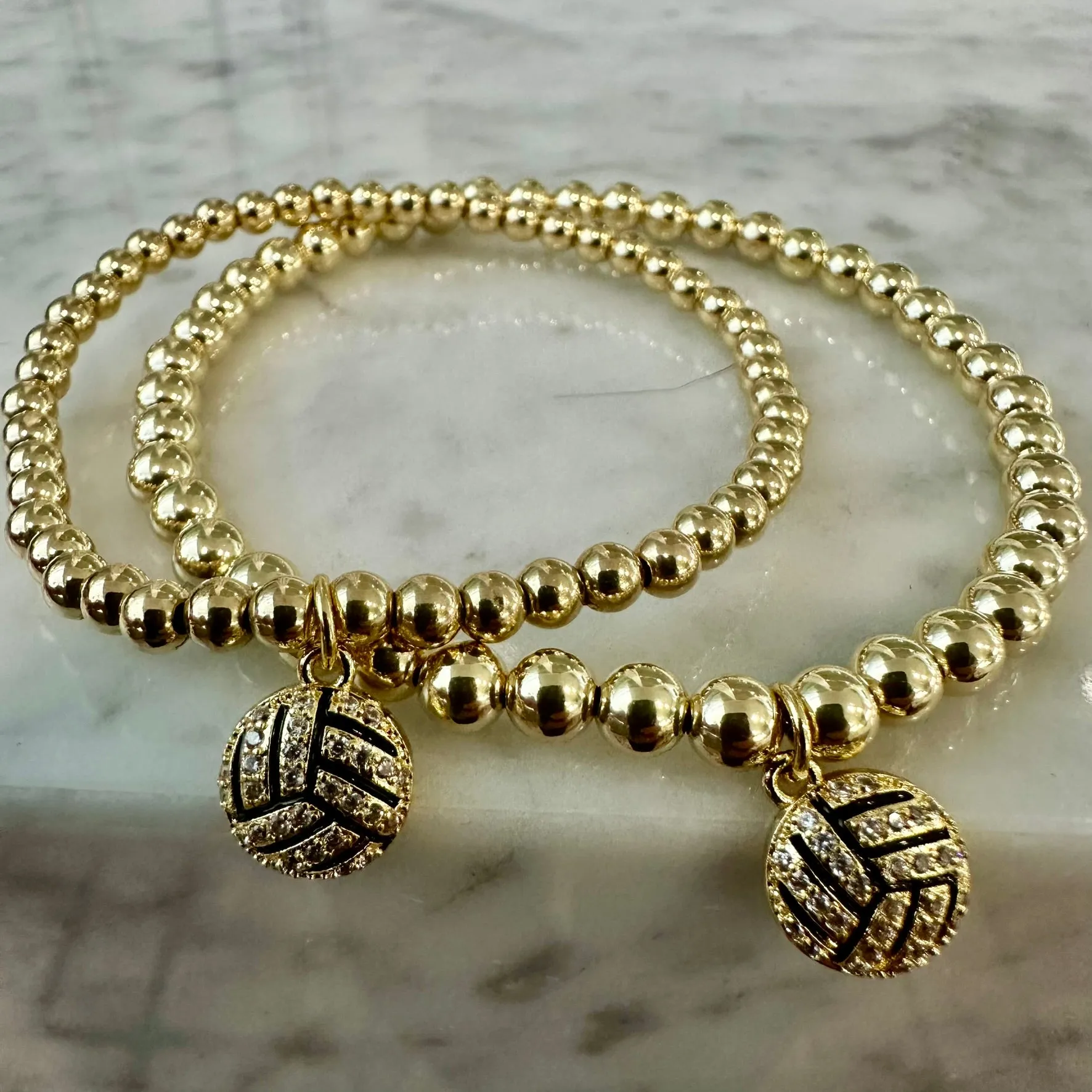 4mm Bead Stretch Bracelet with Matching Cubic Zirconia Sports Charm