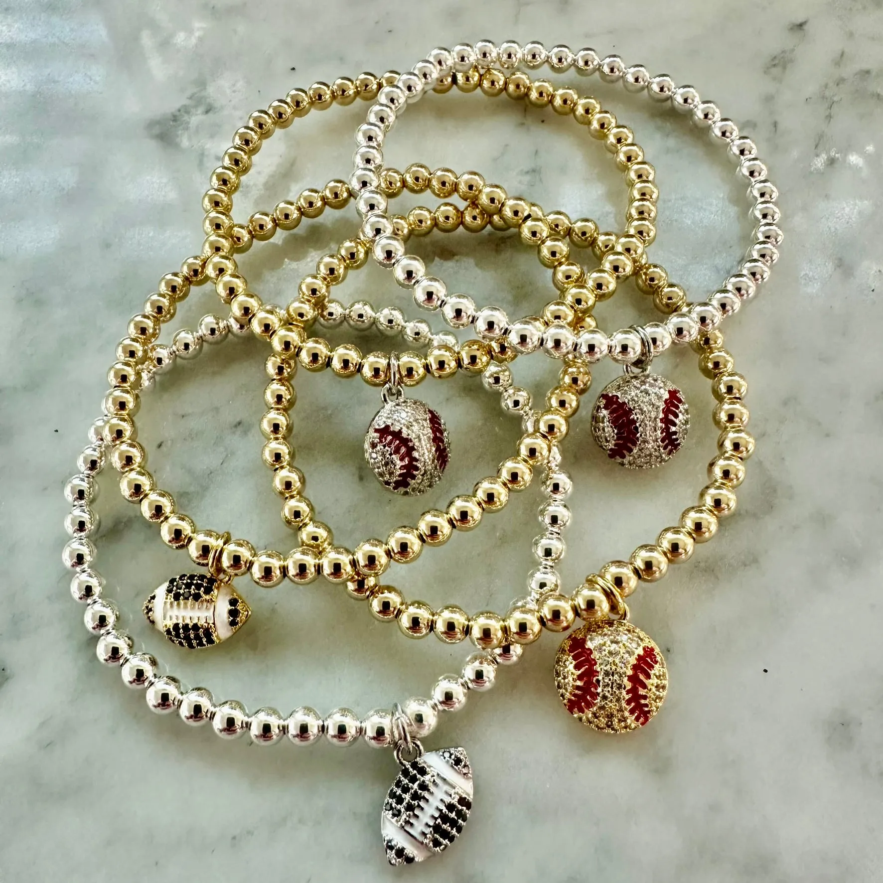 4mm Bead Stretch Bracelet with Matching Cubic Zirconia Sports Charm