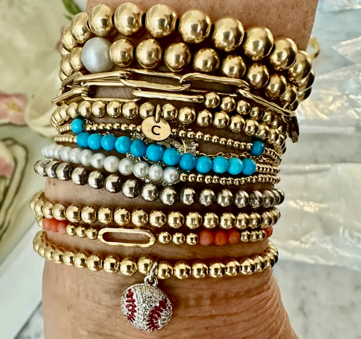 4mm Bead Stretch Bracelet with Matching Cubic Zirconia Sports Charm