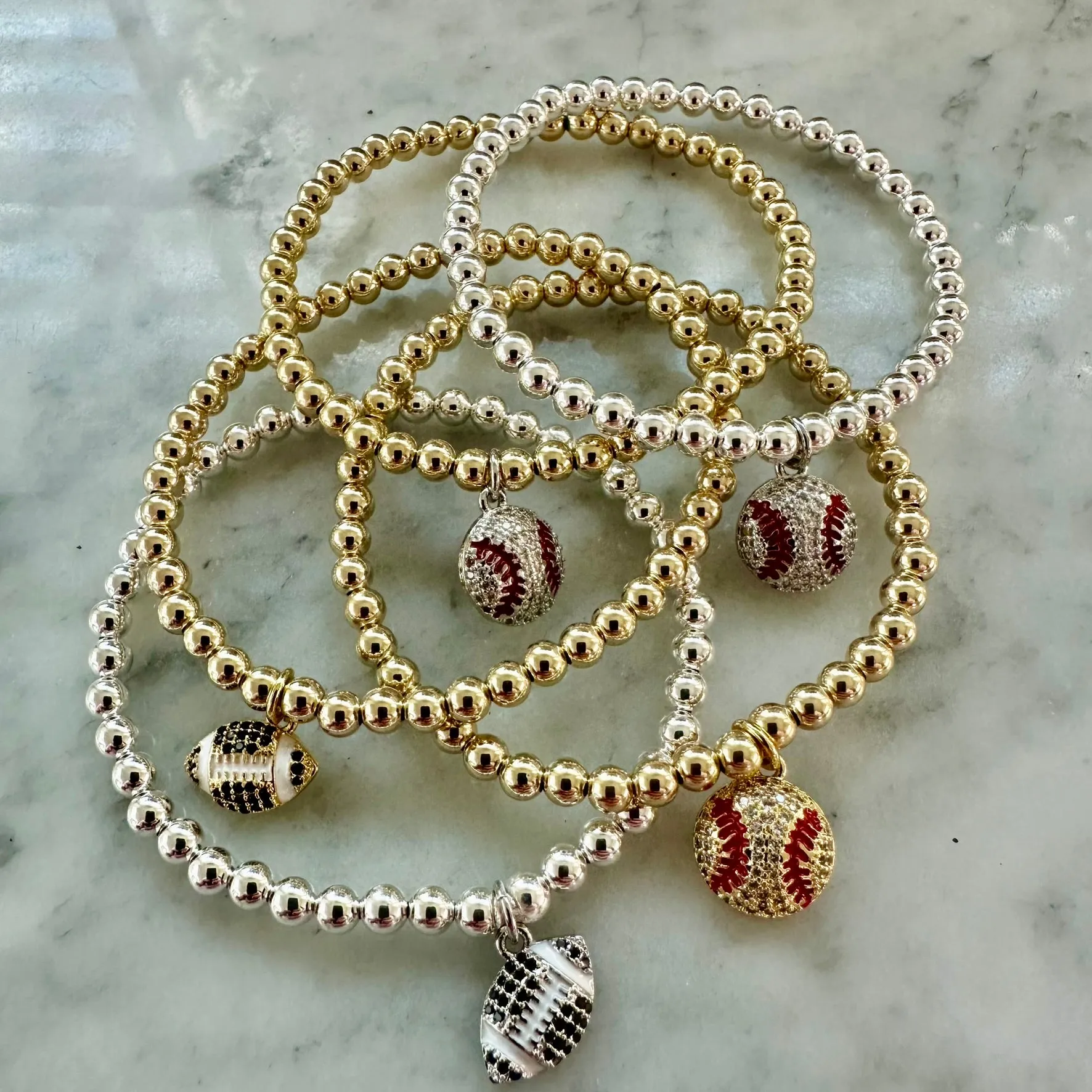4mm Bead Stretch Bracelet with Matching Cubic Zirconia Sports Charm