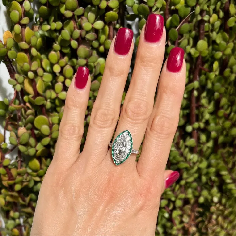 Platinum .70ct Old Cut Marquis, .80tcw Emerald & .60tcw Diamond Ring at Regard Jewelry in Austin, Texas