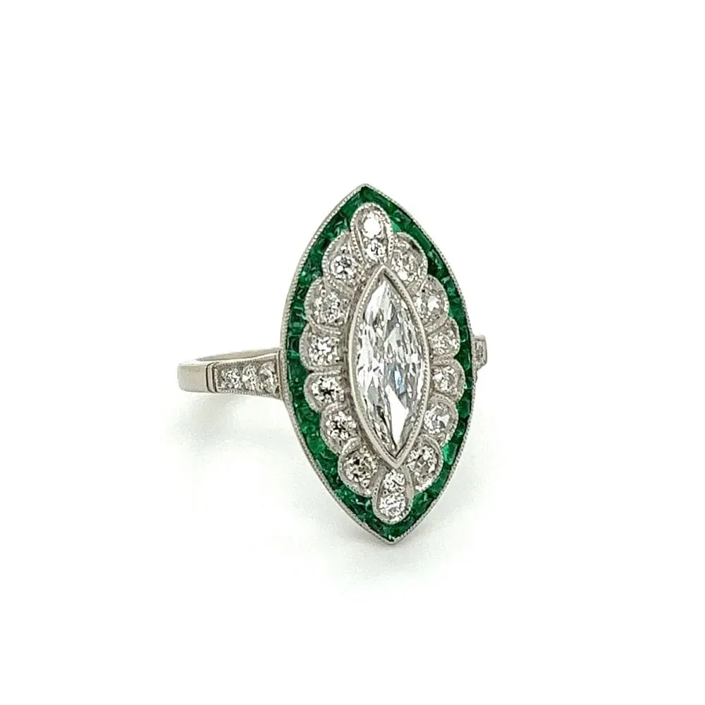 Platinum .70ct Old Cut Marquis, .80tcw Emerald & .60tcw Diamond Ring at Regard Jewelry in Austin, Texas