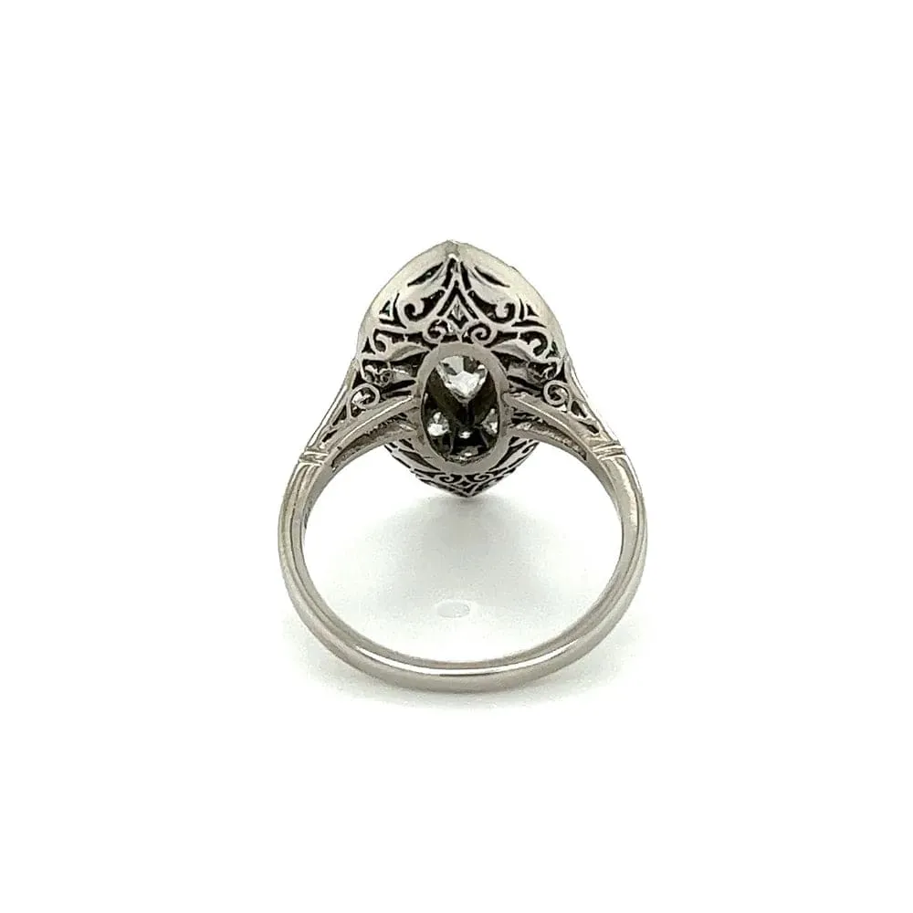 Platinum .70ct Old Cut Marquis, .80tcw Emerald & .60tcw Diamond Ring at Regard Jewelry in Austin, Texas