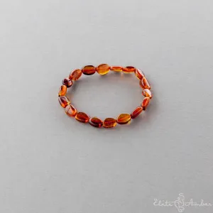 Polished amber pebbles bracelet